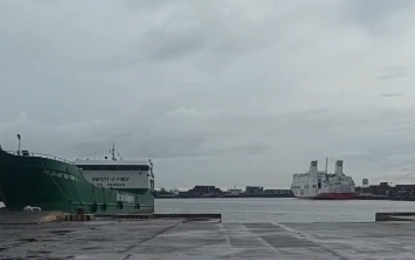 <p><strong>STRANDED.</strong> A 2GO Travel vessel (right) bound for Manila remains docked at Bredco port in Bacolod City as of 1 p.m. Monday (Sept. 2, 2024) after the Philippine Coast Guard suspended trips to destinations with a storm warning signal. In Negros Occidental, at least 12 local government units canceled classes, while work at the Provincial Capitol was suspended at noon due to inclement weather brought by Tropical Storm Enteng.  (<em>Photo courtesy of Coast Guard Station Northern Negros Occidental</em><em>)</em></p>