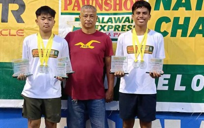 <p><strong>MVP.</strong> Anthony Bjorn Castigador (left) pocketed four titles at the Palawan Pawshop National Juniors Tennis Championship at the Iloilo City Sports Academy hard courts on Monday (Sept. 2, 2024). Also in the photo are doubles partner Rizzjun Miles Labindao and Iloilo City Sports Academy coach Alvin Santiago <em>(Contributed photo) </em></p>