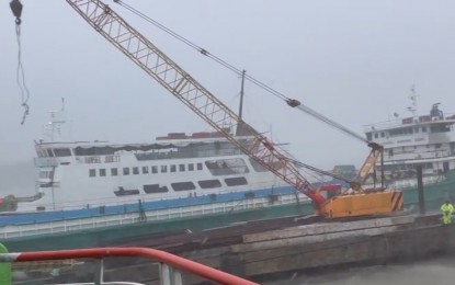 <p><strong>STRANDED</strong>. A stranded ship at the Allen port in Northern Samar in this Sept. 1, 2024 photo. The Philippine Coast Guard (PCG) lifted on Monday (Sept. 2) the temporary suspension of sea travel between Northern Samar and Sorsogon as Tropical Storm Enteng moved farther from Eastern Visayas<em>. (Screengrab courtesy of NemMalou Enriquez) </em></p>