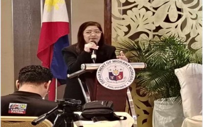 <p><strong>OFW ALLY</strong>. Karen Quilao, Office-in-Charge of the Department of Migrant Workers-Calabarzon, presents the agency’s achievements at the Kapihan sa Bagong Pilipinas forum at Hotel Marciano in Calamba City, Laguna on Tuesday (Sept. 3, 2024). She said the agency processed 15,923 Balik-Manggagawa Overseas Employment Certificates in 2023. <em>(PNA photo by Zen Trinidad)</em></p>