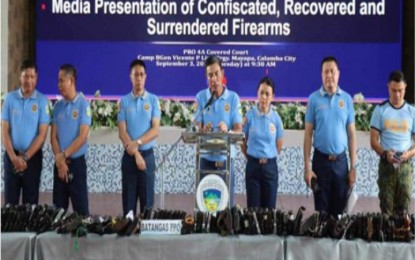 <p><strong>SEIZED FIREARMS</strong>. Brig. Gen. Paul Kenneth Lucas, director of Police Regional Office (PRO)-Calabarzon, presents to the media the results of the intensified campaign against loose firearms from Jan. 1 to Aug. 31, 2024 at Camp Vicente Lim in Calamba City on Tuesday (Sept. 3, 2024). He said the operations netted 2,929 firearms, of which 991 were confiscated and 1,938 were for safekeeping<em>. (Contributed photo) </em></p>