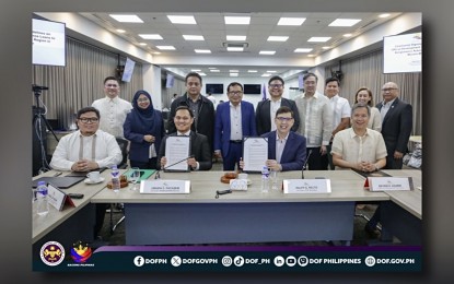 <p><strong>ODA GUIDELINES.</strong> Bangsamoro Government Minister of Finance, Budget and Management Ubaida Pacasem and Finance Secretary Ralph Recto sign the guidelines on official development assistance (ODA) loans for the Bangsamoro Autonomous Region in Muslim Mindanao. The signing ceremony was held on Tuesday (Sept. 3, 2024) at the Department of Finance (DOF) office in Manila. <em>(Photo from DOF)</em></p>