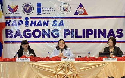 <p><strong>ACCOMPLISHMENTS</strong>. Department of Migrant Workers-Bicol Officer-in-Charge Director Jeena Laceda (center) reports on their accomplishments, programs and activities under the Marcos administration during the Kapihan sa Bagong Pilipinas forum at Hotel Iniego in Legazpi City, Albay on Tuesday (Sept. 3, 2024). DMW-Bicol intensified its fight against traffickers and illegal recruiters by bringing its programs and campaigns to local government units in the region<em>. (PNA photo by Connie Calipay)</em></p>