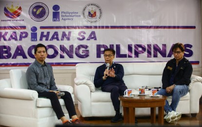 <div class="photo-area">
<div class="caption my-4">
<p><strong>PRO-WORKERS. </strong>Department of Migrant Workers Secretary Hans Leo Cacdac and Overseas Workers Welfare Administration chief Arnell Ignacio (2nd and 3rd from left) guest at the Kapihan sa Bagong Pilipinas forum at the DMW head office in Mandaluyong City on Tuesday (Sept. 3, 2024). They discussed the programs and services of the government for the empowerment of overseas Filipino workers. <em>(PNA photo by Joan Bondoc)  </em></p>
</div>
</div>