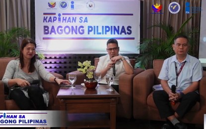 <p><strong>OFW KIOSK</strong>. Lawyer Karl Frederick Arriola (center), OIC regional director of the Department of Migrant Workers-7, and Overseas Workers Welfare Administration Regional Director Reynaldo Jacalan bare their respective office's accomplishments during the Kapihan sa Bagong Pilipinas on Tuesday (Sept. 3, 2024). Arriola said OFWs will soon get their overseas employment certificate right at the international arrival area of the Mactan-Cebu International Airport's Bagong Pilipinas OFW Kiosk. <em>(Screenshot from PIA-7 video) </em></p>