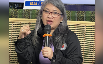 <p><strong>BALIK MANGGAGAWA.</strong> Labor Attaché Angela Trinidad, Director of the Department of Migrant Workers in Davao Region, speaks at the Kapihan sa Bagong Pilipinas forum in Davao City on Tuesday (Sept. 3, 2024). Since 2022, she said the DMW has processed the papers of 23,879 overseas Filipino workers who returned to their host countries under the “Balik-Manggagawa” program. <em>(PNA photo by Robinson Niñal Jr.)</em></p>