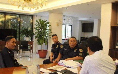 <p><strong>COORDINATION MEETING. </strong> Bureau of Fire Protection (BFP) Antique Fire Marshall Supt. Patricio Collado (left) met with San Remigio Mayor Margarito Mission Jr. (back to the camera) on Wednesday (Sept. 4, 2024) for a coordination meeting of their proposed medical mission in Barangay Cabunga-an on Sept. 26. In an interview, Collado said they are also gearing to train Sangguniang Kabataan officials in Antique as fire safety advocates.  <em>(Photo courtesy of San Remigio LGU)</em></p>