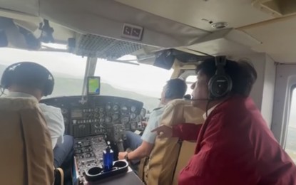 <p><strong>AERIAL INSPECTION.</strong> President Ferdinand R. Marcos Jr. conducts an aerial inspection of flood-hit areas in the cities of Marikina and Antipolo on Wednesday (Sept. 4, 2024). He said his administration would use the large-scale development flood control program initiated by the Aquino government as a “base” to find the solutions with the “most immediate effect” to mitigate floods.<em> (Photo from Malacañang Press Corps Pool)</em></p>