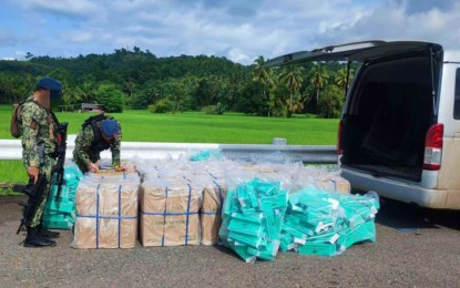 <p><strong>SMUGGLED CIGARETTES</strong>. Police officers check on the confiscated PHP4.4 million worth of smuggled cigarettes while conducting checkpoint operations in Alicia, Zamboanga Sibugay, on Tuesday (Sept. 3, 2024). <em>Three suspects traveling in two vehicles were arrested when flagged down for inspection at the checkpoint. (Photo courtesy of PRO-9)</em></p>