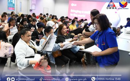 <p><strong>BACK HOME.</strong> Overseas Workers Welfare Association (OWWA) staff assist 99 overseas Filipino workers (OFWs) from Lebanon and Kuwait after they arrived in the country on Thursday (Sept. 5, 2024) via Qatar Airways flight QR934.  The group comprises 20 OFWs from Lebanon and 79 from Kuwait, including five dependents. <em>(Photo courtesy of OWWA)</em></p>