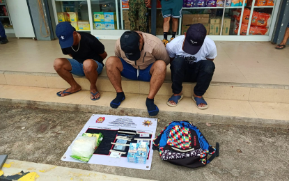 <p><strong>ENTRAPPED.</strong> The three suspects after their arrest during an entrapment operation by police agents in Barangay Awang, Datu Odin Sinsuat, Maguindanao del Norte, on Friday (Sept. 6, 2024). The trio yielded some PHP6.8 million worth of shabu. <em>(Photo courtesy of Sultan Kudarat MPS)</em></p>