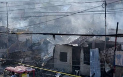 <p><strong>GUTTED.</strong> Some of the houses destroyed by a massive fire in Barangay 5, San Carlos City, Negros Occidental on Friday night (Sept. 6, 2024). The City Disaster Risk Reduction and Management Office on Saturday (Sept. 7, 2024) reported that about 106 families who lost their homes were temporarily staying in the gymnasium in Barangay 4. <em>(Photo from Mayor Renato Gustilo’s Facebook page)</em></p>