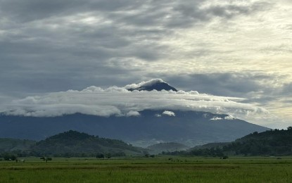 <p><strong>RESTIVE VOLCANO.</strong> A view of Mt. Kanlaon, seen on a quiet day in this photo taken on Aug. 26, 2024. The Philippine Institute of Volcanology and Seismology (Phivolcs) is monitoring the volcano closely after recording more than 200 earthquakes since Monday evening (Sept. 10, 2024).<em> (PNA file photo)</em></p>