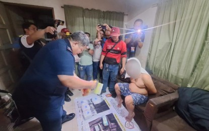 <p><strong>STING OP.</strong> PNP Drug Enforcement Group (PDEG) chief Brig. Gen. Eleazar Matta inspects the pieces of evidence seized during the buy-bust operation in Imus City, Cavite on Monday (Sept. 9, 2024). PDEG operatives seized 4 kg. of shabu worth PHP27.2 million from the arrested high-value target identified as alias "Abie".<em> (Photo courtesy of PDEG)</em></p>