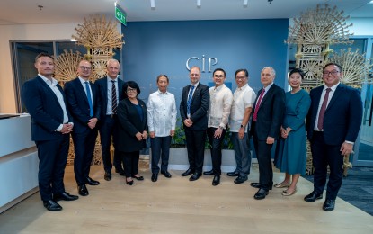 <p><strong>MANILA OFFICE.</strong> Government officials and executives of the Copenhagen Infrastructure Partners (CIP) inaugurate the company's Philippine headquarters at the ORE Central in Bonifacio Global City, Taguig City on Tuesday (Sept. 10, 2024). From left to right are Copenhagen Offshore Partners co-CEO Rune Damgaard and partner and co-CEO Jesper Holst; CIP partner of growth market fund Robert Helms; DENR Secretary Maria Antonia Yulo-Loyzaga; DOE Secretary Raphael Lotilla; CIP associate partner Przemek Lupa; OSAPIEA Secretary Frederick Go; Philippine Ambassador to Denmark Leo Herrera-Lim; Danish Ambassador Franz-Michael Skjold Mellbin; Copenhagen Infrastructure Service Co. regional managing director Marina Hsu and business development director Francis Isagani Daba. <em>(Courtesy of CIP)</em></p>