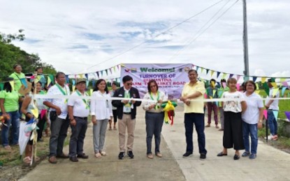 <p><strong>FARM TO MARKET ROAD.</strong> The local government of Cabatuan, Isabela, together with the officials of the Department of Agrarian Reform Cagayan Valley lead the turnover ceremony of the newly rehabilitated farm-to-market road in Barangay Rang-ay on Monday (Sept. 9, 2024). DAR said the PHP21.6 million road project in Barangays Rang-ay and Diamantina would boost agricultural activities in the province.  <em>(Photo courtesy of DAR)</em></p>