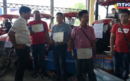 <p><strong>AID DISTRIBUTION.</strong> President Ferdinand R. Marcos Jr. leads the distribution of agricultural, fishery, and veterinary interventions to farmers, fisherfolk, and livestock raisers at the Mariano Marcos State University in Batac City, Ilocos Norte on Wednesday (Sept. 11, 2024). The distribution of assistance is part of the efforts to boost and develop the agriculture sector in the country. <em>(Screenshot from Radio Television Malacañang)</em></p>