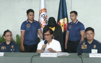 <p><strong>ARRESTED</strong>. Interior and Local Government Secretary Banjamin Abalos (seated, center) presents to the media Teddy Jay Mojeca Mejia at the Ninoy Aquino International Airport on Thursday (Sept. 12, 2024). Mejia is a big-time Filipino child sex trafficker who was arrested in Dubai, United Arab Emirates. <em>(Screengrab)</em></p>