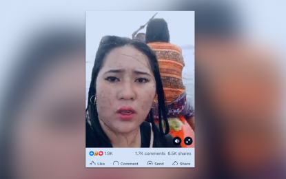 <p><strong>RESCUED.</strong> Uanice Cacao Dipon, one of the eight passengers rescued from a capsizing pump boat off Surigao City on Wednesday (Sept. 11, 2024), records the incident live on Facebook, calling for help. The rescue involved a passing pump boat and the Philippine Coast Guard.<em> (Screenshot from Dipon's Facebook video)</em></p>