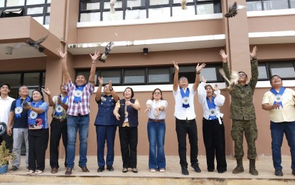 <p><strong>NPA-FREE</strong>. Officials in Burauen, Leyte release pigeons as a sign of peace during a ceremony on Thursday (Sept. 12, 2024). This town, known in the past as a hotbed of insurgency in central Leyte, has been declared completely free from threats of the New People’s Army<em>. (PNA photo by Sarwell Menianio) </em></p>