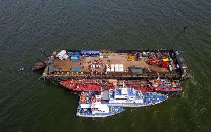 <p><strong>FINAL INSPECTION.</strong> The Harbor Star salvor vessel with a cargo ship and two ships of the Philippine Coast Guard (PCG) holds the final inspection of the siphoning operation at the site of the sunken MTKR Terranova in the waters of Limay town, Bataan province on Thursday (Sept. 12, 2024). The PCG said an estimated 2.57 percent of the total oil cargo of the tanker were lost since its sinking due to various factors. <em>(Photo courtesy of PCG)</em></p>