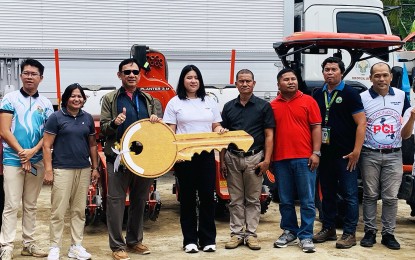 <p><strong>FARM INTERVENTIONS.</strong> DA-13 Regional Executive Director Arlan Mangelen (3rd from left) and Mayor Karen Rosales (4th from left) lead the turnover of various farm equipment and machinery worth more than PHP23.1 million to 11 farmer associations and cooperatives in Las Nieves, Agusan del Norte on Friday (Sept. 13, 2024). The distribution of interventions in the region amounting to PHP69 million coincided with the celebration of President Ferdinand Marcos Jr. <em>(PNA photo by Alexander Lopez)</em></p>