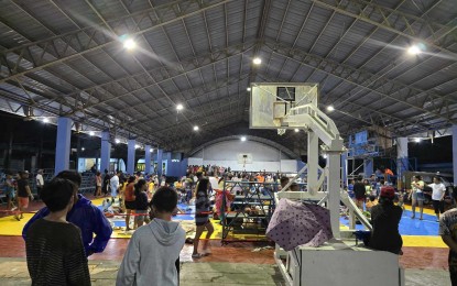 <p><strong>EVACUATED.</strong> Hundreds of residents in Siaton, Negros Oriental are temporarily sheltered at the town gymnasium starting late Thursday (Sept. 12, 2024) after heavy rains caused flooding in some areas. Classes were suspended Friday (Sept. 13) in the entire province as heavy rains threaten more flooding. <em>(Photo courtesy of PDRRMO Negros Oriental Facebook)</em></p>