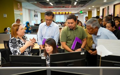 <p><strong>SPECIAL CLASS BPO.</strong> Senators Sherwin Gatchalian and Mark Villar and Philippine Amusement and Gaming Corporation chairperson Al Tengco (2nd to 4th from left) inspect a Special Class Business Process Outsourcing in Aseana, Parañaque City on Friday (Sept. 13, 2024). Villar, who chairs the Committee on Games and Amusement, assured that SCBPOs will not be included in the implementation of President Ferdinand R. Marcos Jr.'s directive to shut down Philippine Offshore Gaming Operators before the year ends. <em>(Photo courtesy of Sen. Villar office)</em></p>