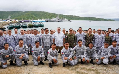 <p><strong>ENHANCING DEFENSE.</strong> Defense Secretary Gilberto Teodoro Jr and top military officers led by Armed Forces chief, Gen. Romeo Brawner Jr., and personnel at Naval Detachment Oyster Bay during their visit on Thursday (Sept. 12, 2024). The AFP on Friday (Sept .13) said the visit was aimed at assessing ongoing infrastructure developments at the bases that are vital in enhancing the country’s external defense posture. <em>(Photo courtesy of the AFP)</em></p>