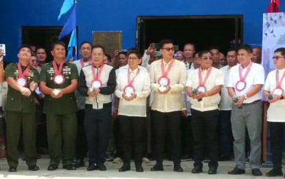 <p><strong>NPA-FREE</strong>. Officials in Calbayog City, Samar release pigeons as a sign of peace during a ceremony on Friday (Sept. 13, 2024). Calbayog City in Samar province is the first city in Eastern Visayas to be declared under a Stable Internal Peace and Security Condition or completely free from threats of the New People’s Army. <em>(Photo courtesy of Calbayog city government) </em></p>