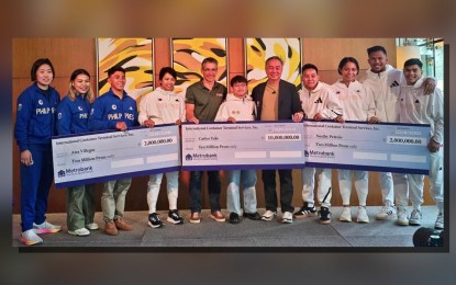 <p><strong>MORE INCENTIVES.</strong> Carlos Yulo (center) receives his PHP10-million incentive from the International Container Terminal Services Inc. at Solaire Resort in Parañaque City on Friday (Sept. 13, 2024). With Yulo are (from left) judoka Kiyomi Watanabe, weightlifters Vanessa Sarno and John Febuar Ceniza, boxer Aira Villegas, ICTSI executive vice president Christian Martin Gonzalez, Philippine Olympic Committee president Abraham Tolentino, boxer Nesthy Petecio, rower Joanie Delgaco, and boxers Eumir Felix Marcial and Carlo Paalam.<em> (Photo courtesy of POC)</em></p>