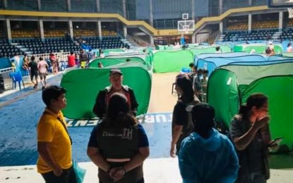 <p><strong>DISPLACED.</strong> The Manuel Y. Torres Memorial Coliseum and Cultural Center serves as one of the evacuation centers for families displaced by heavy rains and floods in Bago City, Negros Occidental since Friday night (Sept. 13, 2024). At least 13,509 families in Negros Occidental, including Bacolod City, are affected. <em>(Photo courtesy of Bago City Information Office)</em></p>