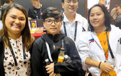 <p><strong>NEW FILIPINO GM</strong>. Daniel Quizon (2nd from left) with teammates (from left) Jan Jodilyn Fronda, Paulo Bersamina and Janelle Mae Frayna during the Chess Olympiad in Budapest, Hungary on Saturday (Sept. 14, 2024). Quizon beat GM Igor Efimov of Monaco to meet the required 2500 Elo rating and earn a Grandmaster title. <em>(Contributed photo)</em></p>