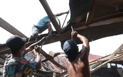 <div class="caption my-4">
<p><strong>AFTERMATH.</strong> Residents salvage scrap materials from one of the collapsed structures in the razed <span class="x193iq5w xeuugli x13faqbe x1vvkbs x1xmvt09 x1lliihq x1s928wv xhkezso x1gmr53x x1cpjm7i x1fgarty x1943h6x xudqn12 x3x7a5m x6prxxf xvq8zen xo1l8bm xzsf02u x1yc453h" dir="auto">Aroma Compound in Road 10, Tondo, Manila on Sunday (Sept. 15, 2024). </span><span class="x193iq5w xeuugli x13faqbe x1vvkbs x1xmvt09 x1lliihq x1s928wv xhkezso x1gmr53x x1cpjm7i x1fgarty x1943h6x xudqn12 x3x7a5m x6prxxf xvq8zen xo1l8bm xzsf02u x1yc453h" dir="auto">Nearly 2,000 displaced families are staying in three evacuation centers. </span><em>(PNA photo by Avito Dalan) </em></p>
</div>