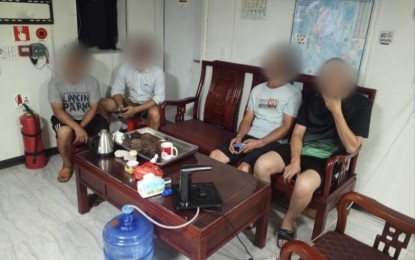 <p><strong>DREDGER CREW.</strong> Four crew members of the dredger vessel MV Sangko Uno suspected to be undocumented Chinese nationals following their apprehension at Navotas Port on Sunday (Sept. 15, 2024). The Philippine Coast Guard on Monday (Sept. 16) collected relevant documents to pursue an investigation into the ship's crew with assistance from the Bureau of Immigration.<em> (Photo courtesy of PCG)</em></p>