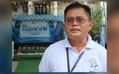 <p><strong>FISH CONSERVATION.</strong> BFAR-Davao Region Officer-in-Charge Director Relly Garcia discusses the importance of sustainability and food security during the opening of the 61st Fish Conservation Week in Davao City on Monday (Sept. 16, 2024). He emphasized the critical role of the marine ecosystem, as well as the country's farmers and fisherfolk, in the country's development.<em> (PNA photo by Robinson Niñal Jr.)</em></p>