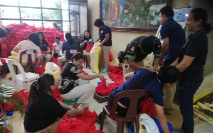 <p><strong>HELP.</strong> The Antique Provincial Social Welfare and Development Office (PSWDO) repacks food for relief distribution on Monday (Sept. 16, 2024). Antique Governor Rhodora Cadiao is appealing for help for the over 30,000 families affected by the inclement weather. <em>(PNA photo by Annabel Consuelo J. Petinglay)</em></p>