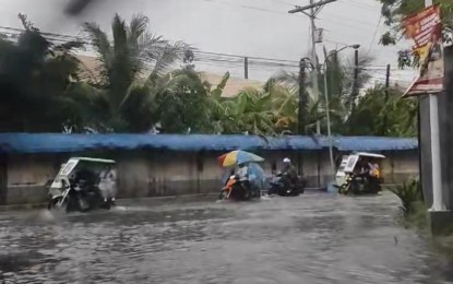 <p><strong>FLOODED</strong>.  A flooded area in Polangui town in Albay province on Monday (Sep. 16, 2024). The Office of Civil Defense in Bicol reported 85 flooding incidents in four provinces of the region<em>. (Screenshot from video courtesy of Jonathan Bondad) </em></p>