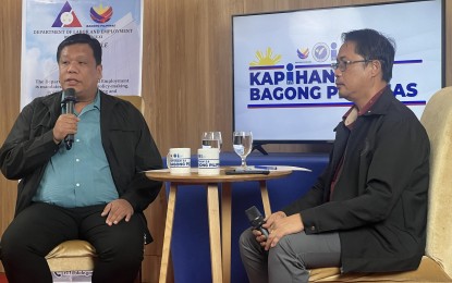 <p><strong>TUPAD AID.</strong> DOLE-11 Assistant Director Jason Balais (left) speaks during the ‘Kapihan sa Bagong Pilipinas’ forum in Davao City on Tuesday (Sept. 17, 2024), where he reported that the agency has released PHP3.5 billion in Tulong Panghanapbuhay sa Ating Disadvantaged/Displaced Workers (TUPAD) aid since 2022. The program has provided temporary employment to 591,107 individuals across the region.<em> (PNA photo by Robinson Niñal Jr.)</em></p>