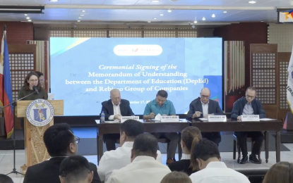 <p><strong>EDUCATION PRIORITIES.</strong> Department of Education (DepEd) Secretary Sonny Angara (sitting 2nd from left) signs a partnership with executives of the Rebisco Group of Companies at the DepEd Central Office in Pasig City on Tuesday (Sept. 17, 2024). Angara lauded the group's support to help improve the quality of education in the country. <em>(Screengrab)</em></p>