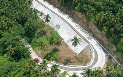 <p><strong>SAFE</strong> <strong>TRAVELS</strong>. A road slope protection structure recently completed by the Department of Public Works and Highways (DPWH) in Baybay, Leyte. The project now protects motorists and pedestrians from the destructive effects of flooding and landslides in the town's Barangay Imelda<em>. (Photo courtesy of DPWH) </em></p>