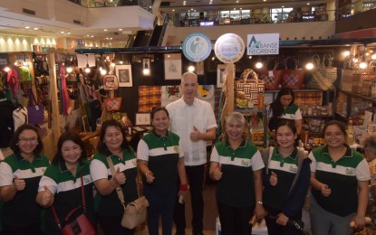 <p><strong>NEGROS TRADE FAIR.</strong> Negros Occidental Governor Eugenio Jose Lacson (center) with some of the department and office heads of the provincial government, during the opening of the booths of the 38th Negros Trade Fair at the Glorietta 2 Activity Center in Makati City on Wednesday (Sept. 18, 2024). This year’s edition features 115 exhibitors. <em>(Photo courtesy of PIO Negros Occidental)</em></p>