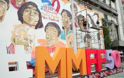 <p><strong>#MMFF50. </strong>The work-in-progress mural featuring several faces of the most prominent actors in the Philippine film industry in the past five decades along EDSA in Guadalupe, Makati City on Thursday (September 19, 2024). Metro Manila Film Festival (MMFF) Overall Concurrent Chair Don Artes led the launch of the 'Sine Sigla sa Singkwenta' celebration that will offer moviegoers a chance to watch on the big screen 50 of the best MMFF movies in the past 50 years for only PHP50.<em> (Photo courtesy of MMDA)</em></p>