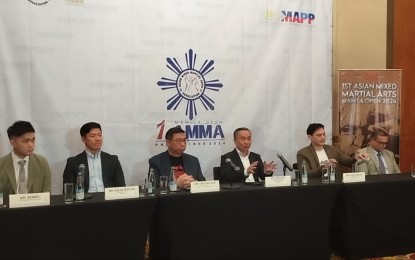 <p><strong>MIXED MARTIAL ARTS.</strong> Philippine Olympic Committee and Nasyonal Mixed Martial Arts Pederasyon ng Pilipinas president Abraham Tolentino (4th from left) announces the first-ever Asian Mixed Martial Arts Manila Open during a press conference at the Marriott Hotel in Pasay City on Wednesday (Spt. 18, 2024). The 11-divisio event will be held at the grand ballroom of the Manila Marriot Hotel from Oct. 14 to 16. <em>(PNA photo by Jean Malanum)</em></p>