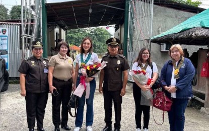 <p><strong>KATARUNGAN CARAVAN.</strong> Justice Undersecretary Margarita Gutierrez (3rd from left), together with prison and local officials, spearhead the Katarungan Caravan at the Correctional Institution for Women in Davao Del Norte on Thursday (Sept. 19, 2024). During the caravan, over 50 lawyers and paralegals, and more than 50 health professionals provided free legal and medical services to around 611 women inmates. <em>(Photo courtesy of DOJ)</em></p>