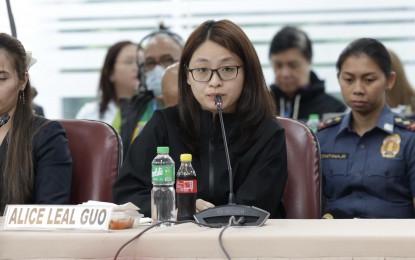 <p><strong>CITED IN CONTEMPT.</strong> Dismissed Bamban Mayor Alice Guo appears before the quad-committee of the House of Representatives during its hearing into the illegal Philippine offshore gaming operators on Thursday (Sept. 19, 2024). Guo’s frequent invocation of her constitutional right against self-incrimination prompted the panel to cite her in contempt. <em>(Photo courtesy of the House Press and Public Affairs Bureau)</em></p>