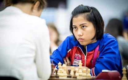 <p><strong>WAITING FOR A MOVE.</strong> Filipino Woman Grandmaster Janelle Mae Frayna from the Philippines (right) waits for Argentinian Maria Jose Campos to make a move during their Round 7 match in the 45th FIDE Chess Olympiad at the BOK Sports Hall in Budapest, Hungary on Wednesday (Sept. 18, 2024). Frayna won after 66 moves of the English Opening. <em>(Contributed photo)</em></p>