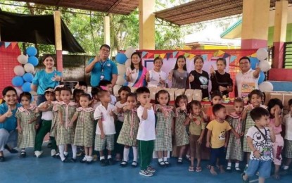 <p><strong>NATIONAL ID FOR KIDS.</strong> Personnel of Philippine Statistics Authority (PSA)-Negros Occidental led by chief statistical specialist John Campomanes during the National ID Rehistro Bulilit Campaign in Barangay Punta Taytay, Bacolod City on Sept. 3, 2024. A total of 54 daycare learners in the village registered to obtain national identification. <em>(Photo courtesy of PSA-Negros Occidental)</em></p>