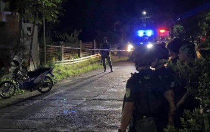 <p><strong>MURDER SCENE.</strong> Police cordon off the area where a village chief was shot dead in Barangay 5 San Silvestre, San Nicolas, Ilocos Norte on Friday evening (Sept. 20, 2024). The police are still determining the identity of the attacker and the possible motive of the killing. <em>(Photo courtesy of Joey Quiaoit)</em></p>