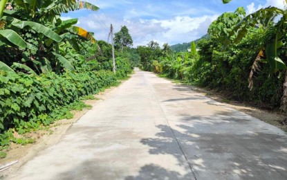 <p><strong>PAVED ROAD.</strong> The new farm-to-market road in Barangay San Nicolas to Caniogan, Coron in Palawan is one of the three farm-to-market roads turned over by President Ferdinand R. Marcos Jr. and Agrarian Reform Secretary Conrado Estrella III  on Sept. 19, 2024. On Monday (Sept. 23), the department believed that the infrastructure would boost the agricultural activities in the province. <em>(Photo courtesy of DAR)</em></p>